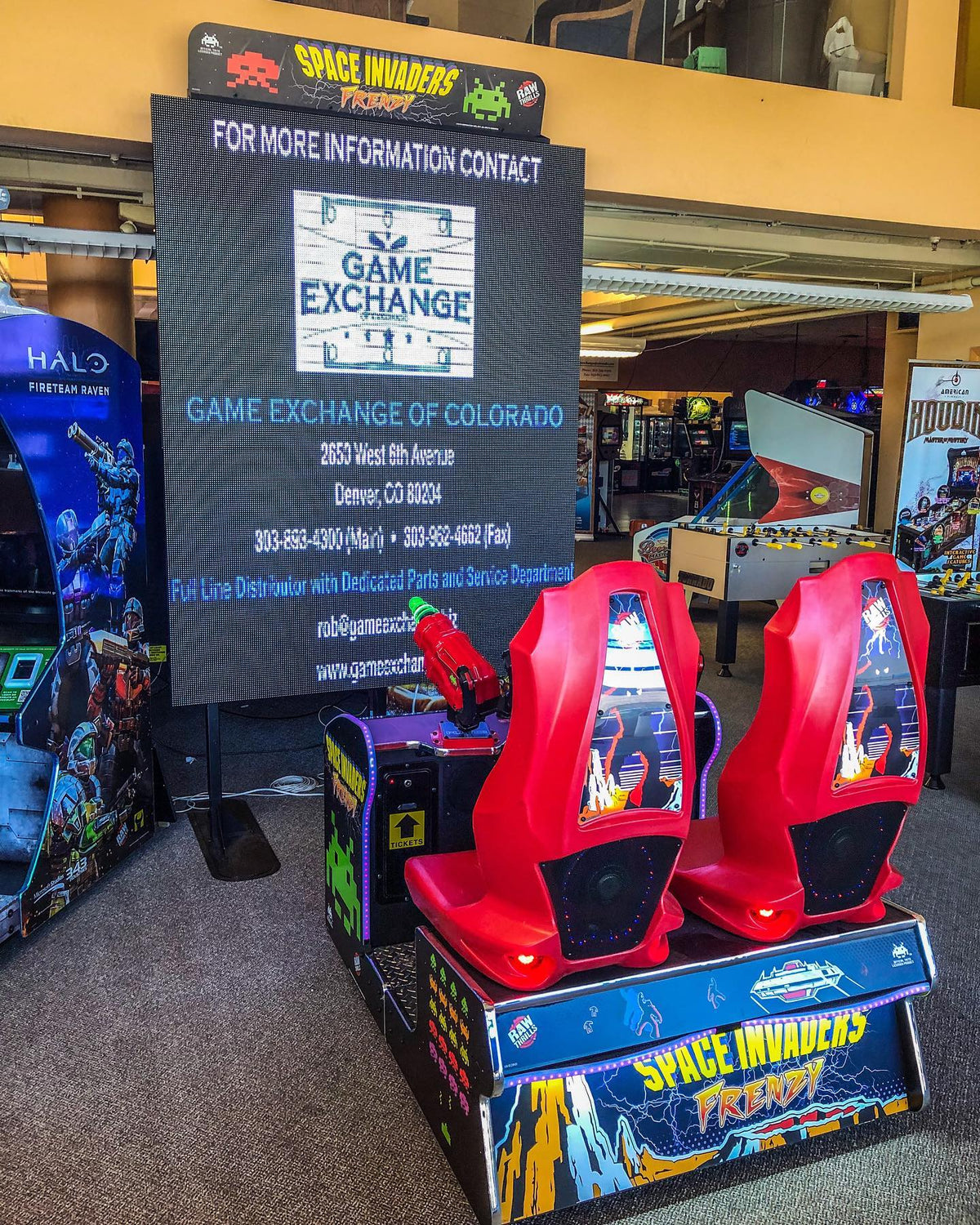 Space Invaders Frenzy arcade machine with giant 109-inch LED screen and 2-player ticket redemption gameplay.