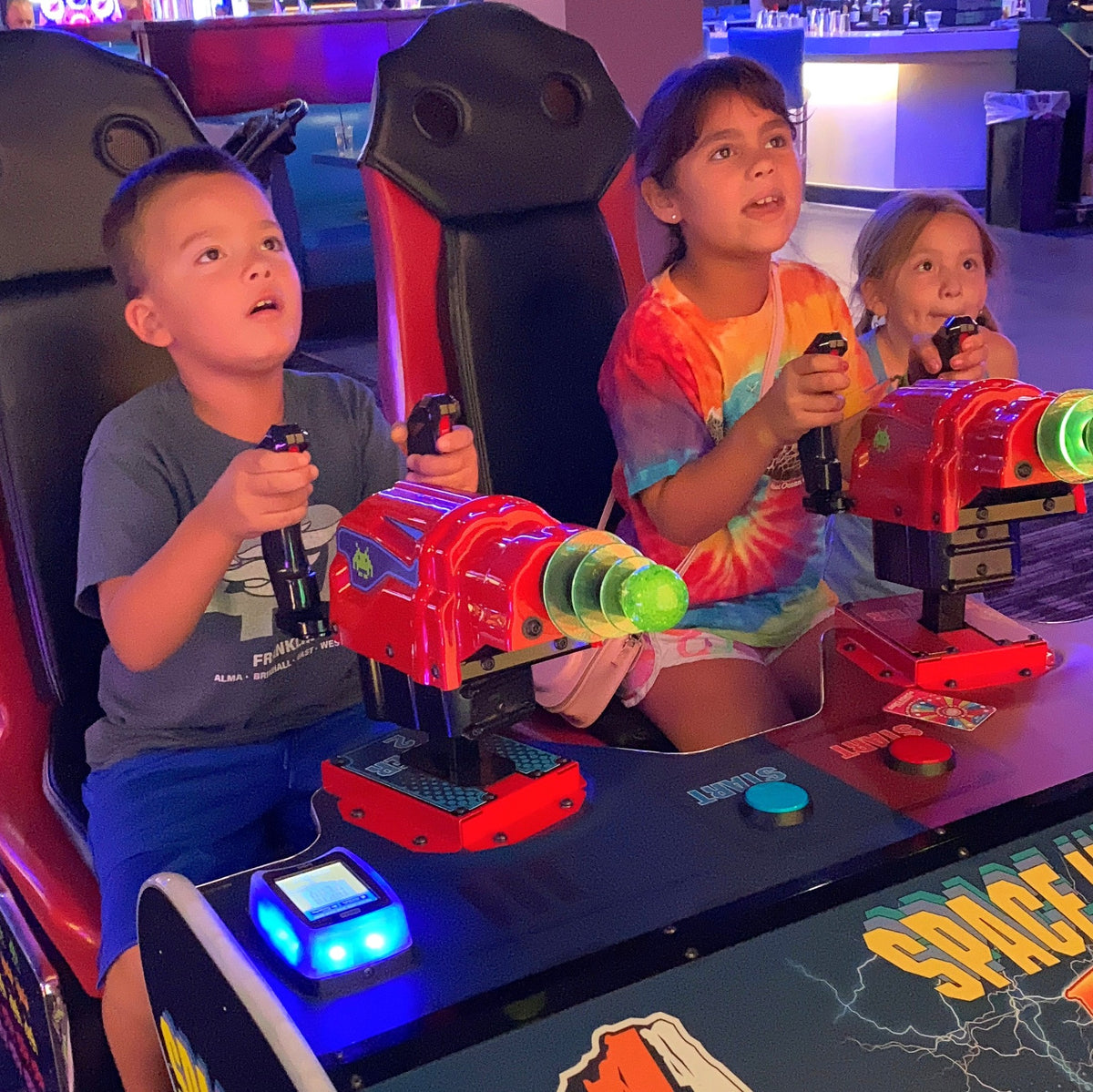 Space Invaders Frenzy arcade machine with giant 109-inch LED screen and 2-player ticket redemption gameplay.