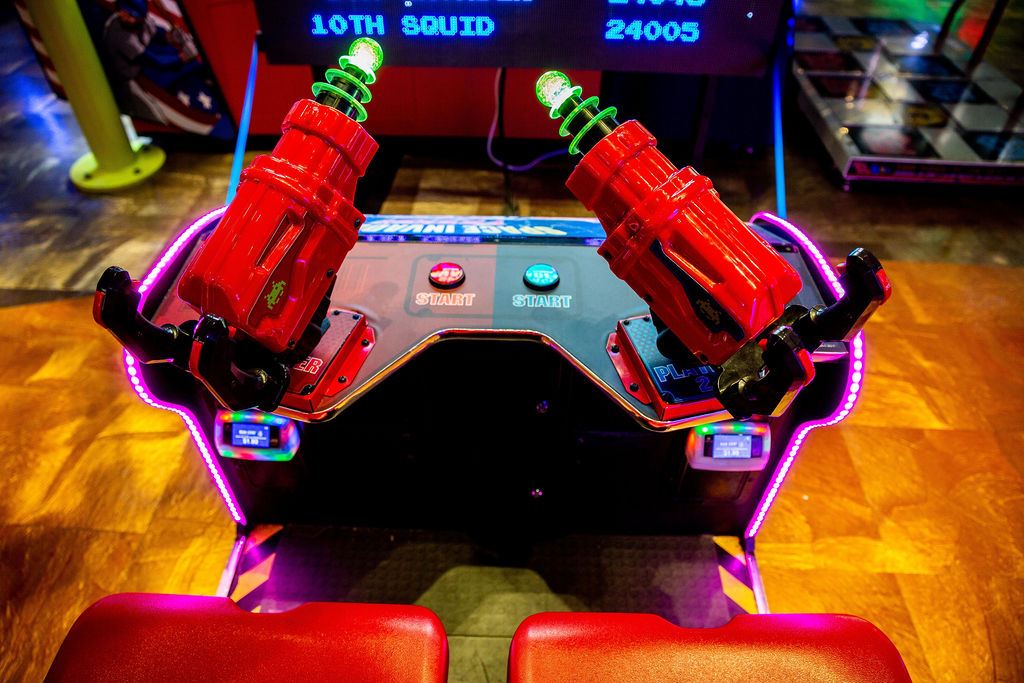 Space Invaders Frenzy arcade machine with giant 109-inch LED screen and 2-player ticket redemption gameplay.