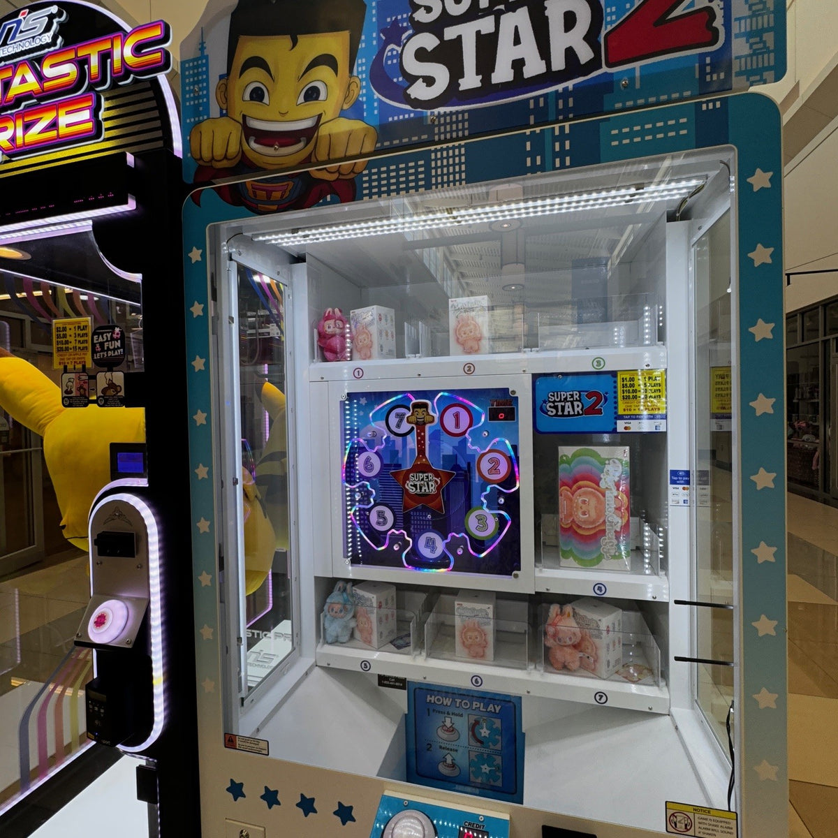 SuperStar2 prize merchandiser arcade machine with skill-based gameplay and ticket redemption features.