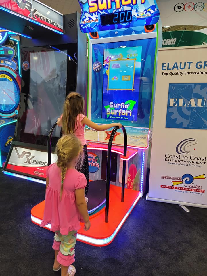 Surfin’ Surfari motion surfboard arcade machine with ticket redemption gameplay and immersive surfing simulation