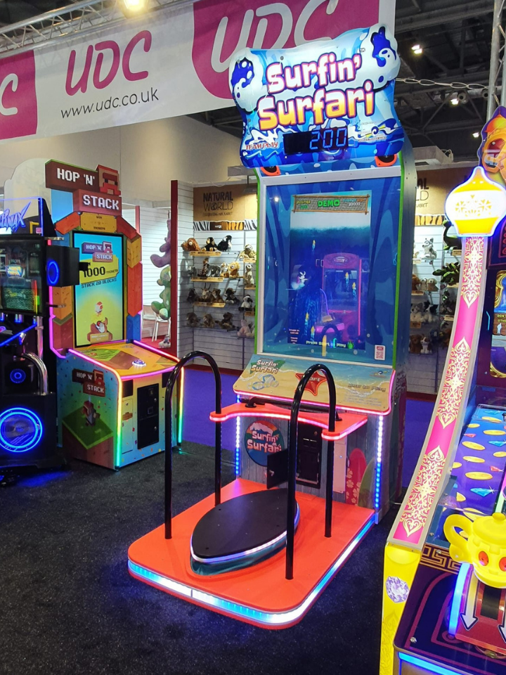 Surfin’ Surfari motion surfboard arcade machine with ticket redemption gameplay and immersive surfing simulation