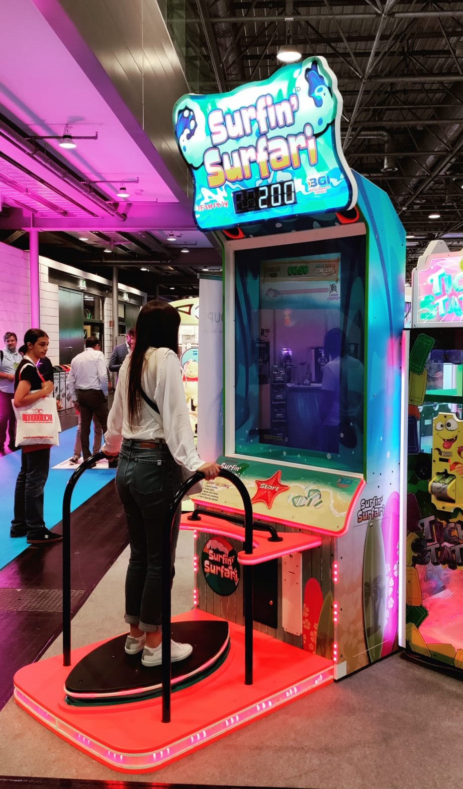 Surfin’ Surfari motion surfboard arcade machine with ticket redemption gameplay and immersive surfing simulation