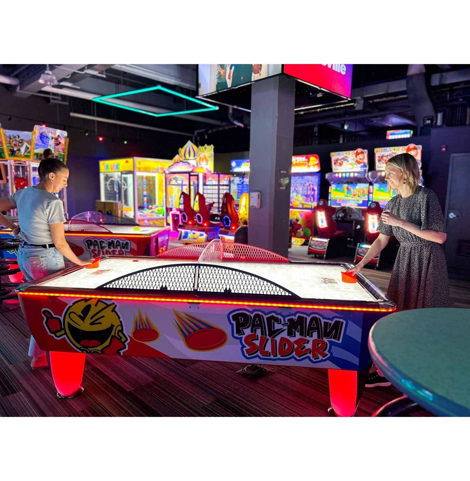 Bandai Namco Pac - Man Slider Air Hockey Table - Coin Operated Arcade Game | LED Color - Changing Playfield | Classic Pac - Man Sounds | Durable Design by Bandai Namco - Air Hockey Tables