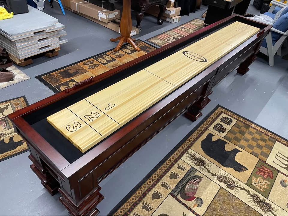 The Prestige shuffleboard table by Berner Billiards in mahogany finish, available in 9ft and 12ft