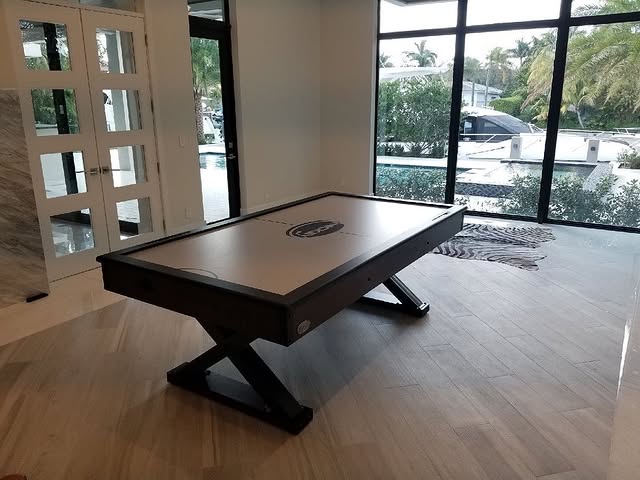 The X-Treme 7-foot air hockey table by Berner Billiards with sleek play surface