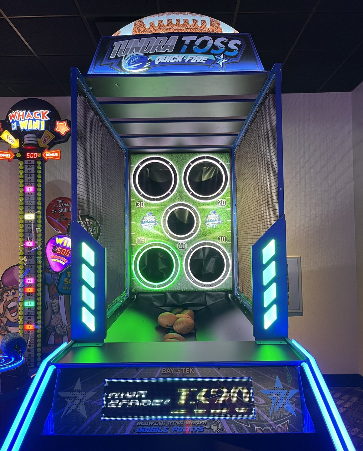 Tundra Toss Quick Fire football toss arcade machine with timed skill gameplay and compact wall cabinet.