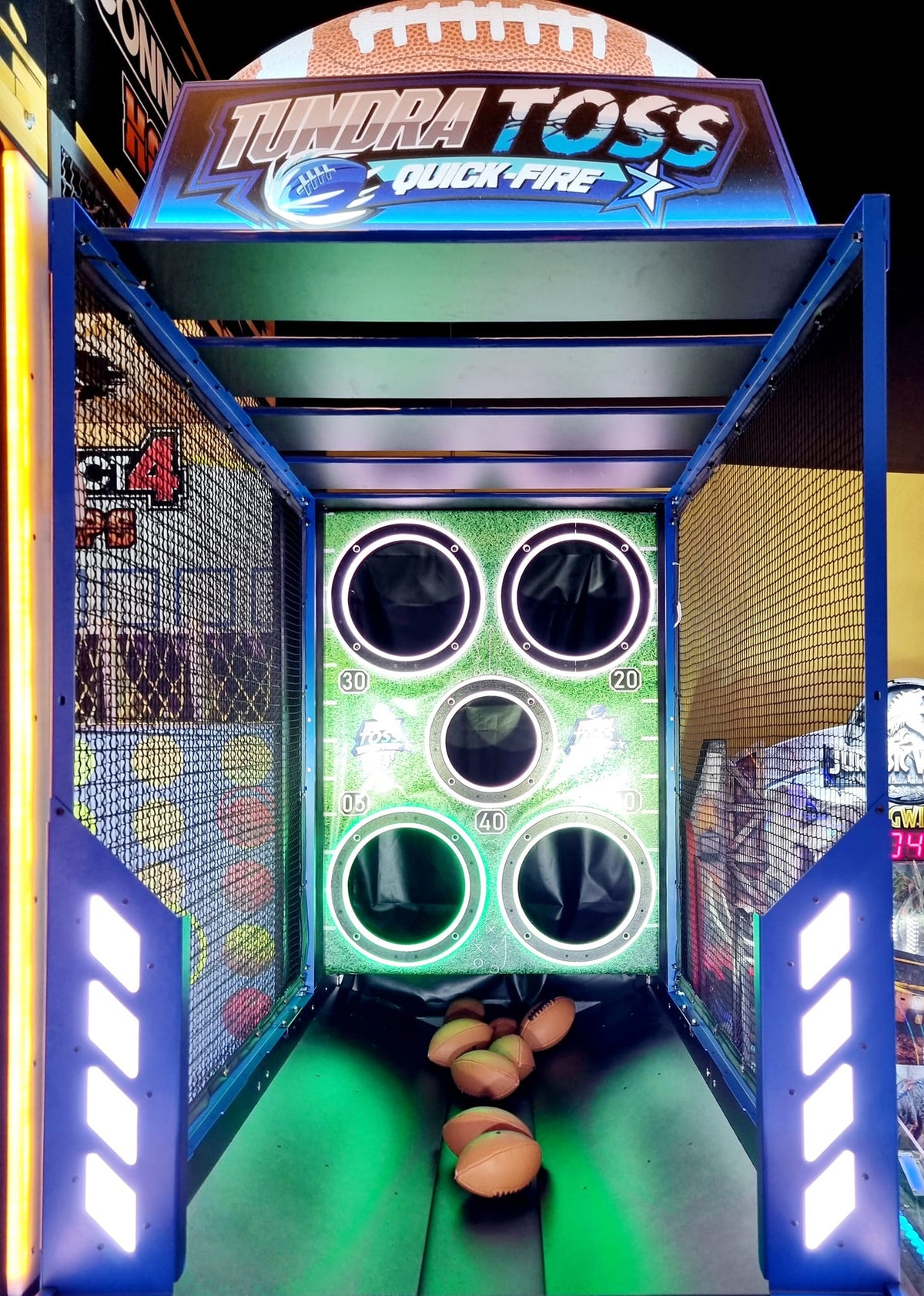 Tundra Toss Quick Fire football toss arcade machine with timed skill gameplay and compact wall cabinet.