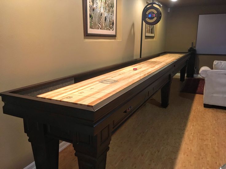 Worthington Shuffleboard Table with Italian Gothic design and Champion’s Signature Playfield.