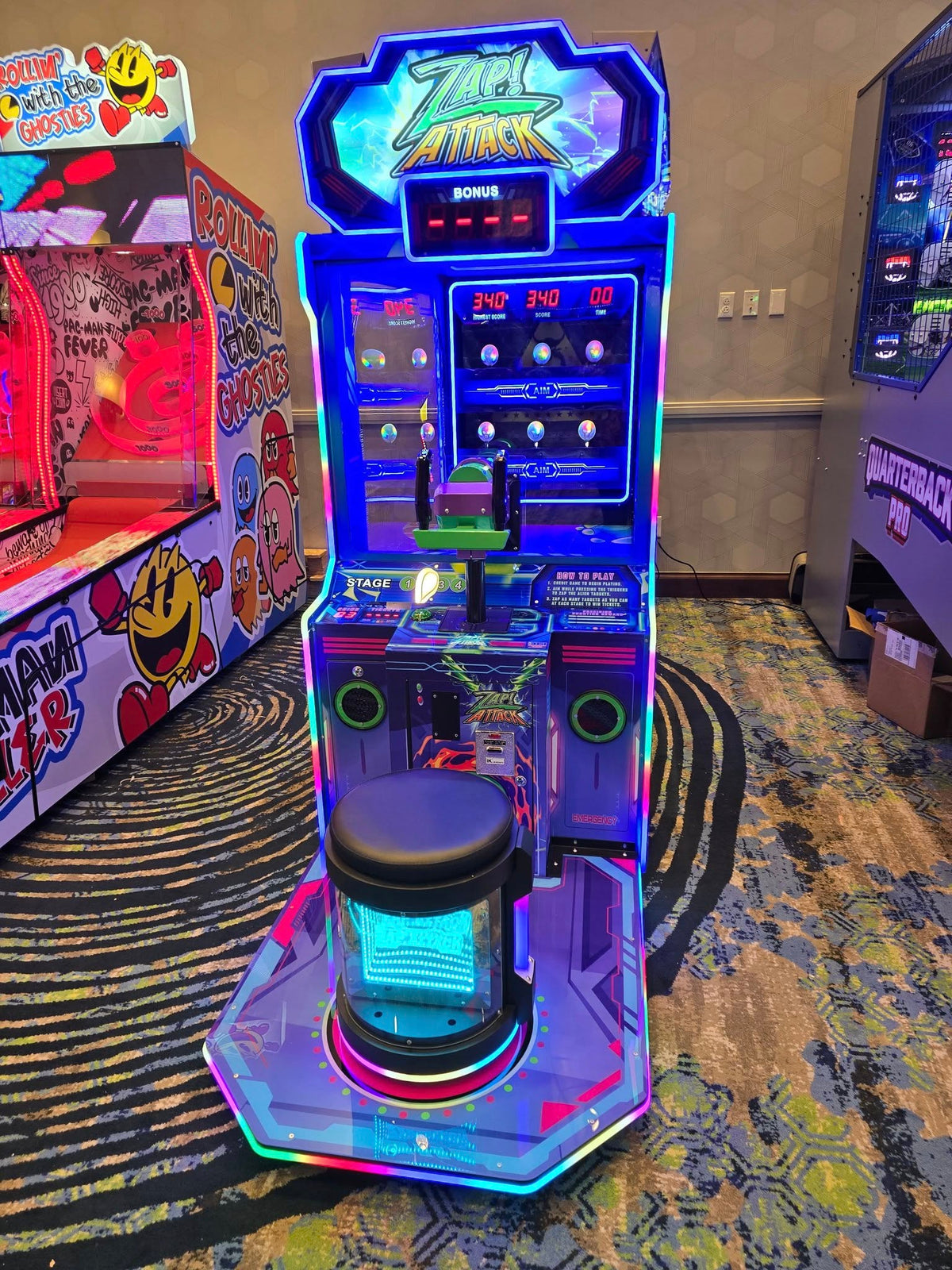 Zap Attack arcade machine featuring alien defense ball shooter gameplay with LED targets and colorful cabinet graphics